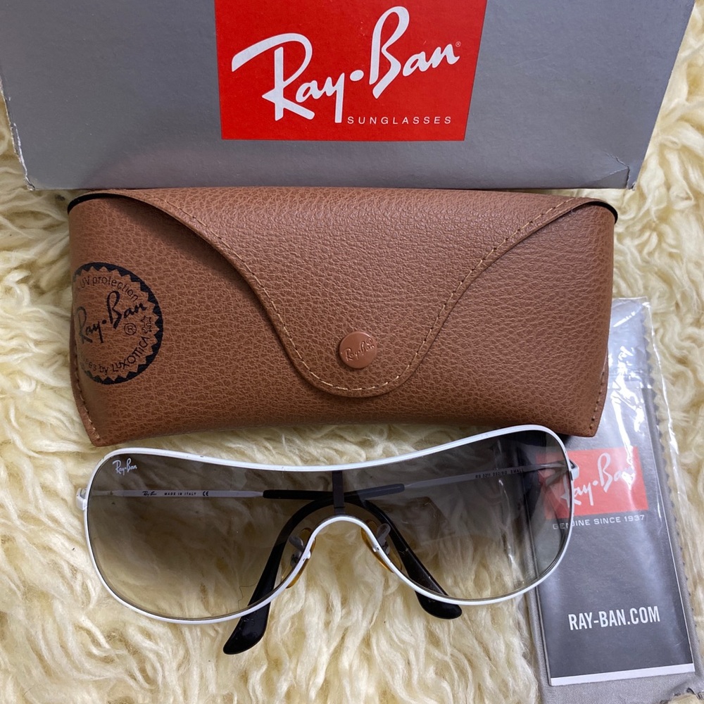 Authentic used Ray-Ban sunglasses with minor scratches